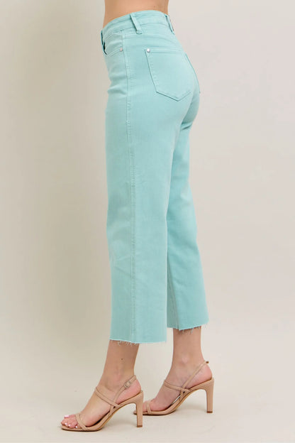 Judy Blue HW Garment Dyed Light Sky Blue Crop Wide Jeans feature frayed hems. Available in sizes 0-24W.