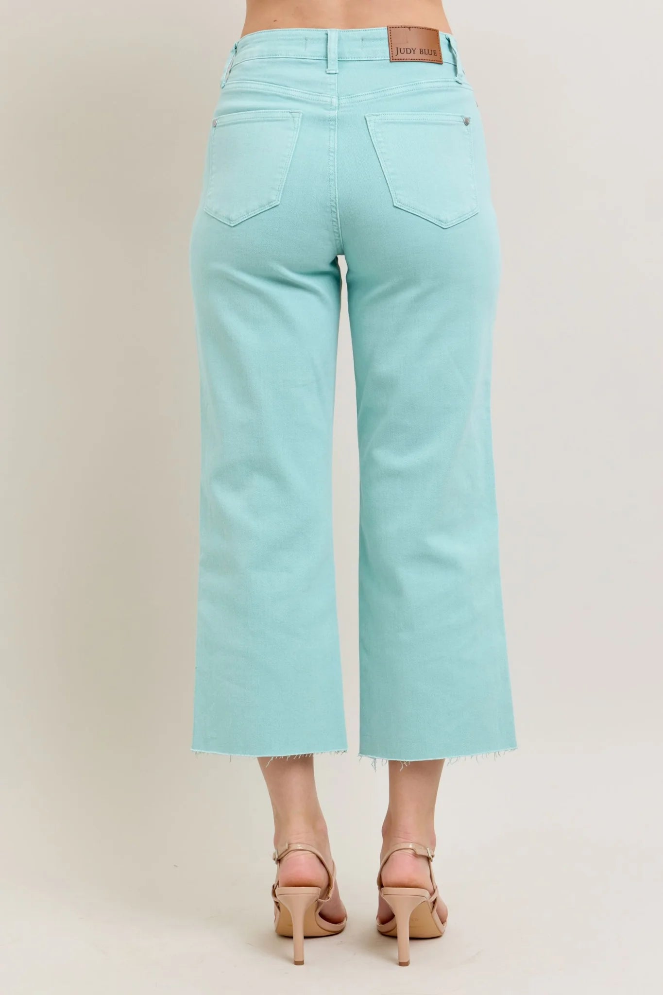 Judy Blue HW Garment Dyed Light Sky Blue Crop Wide Jeans feature frayed hems and a high-waisted design. Sizes available: 0/24 to 24W.