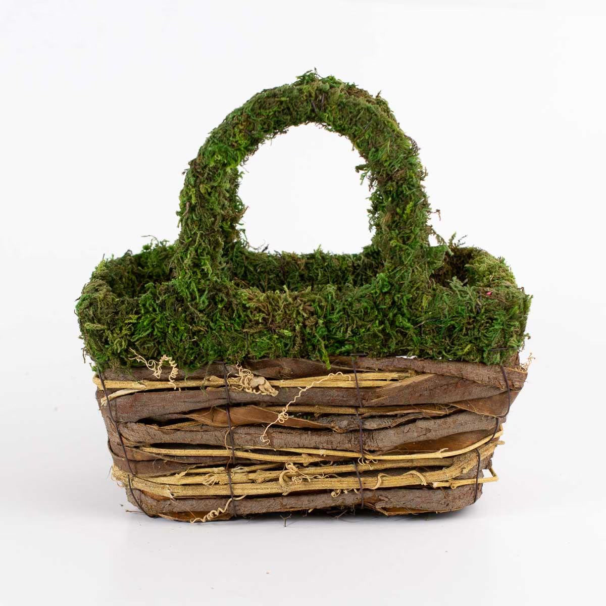 The Dorothy Moss Basket is a natural storage basket featuring brown twigs and a moss-covered handle. Available size: Small.