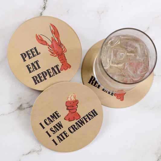 Three Crawfish Reversible Paper Coasters with red crawfish and phrases. Available in one standard size.