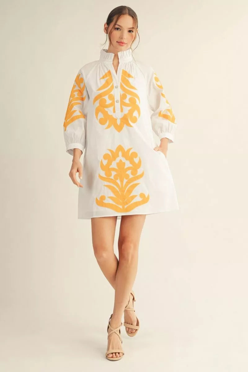 Sunflower Yellow & White Baroque Applique Shift Dress with bold yellow patterns, ruffled collar, buttoned neckline. Sizes XS-XL.