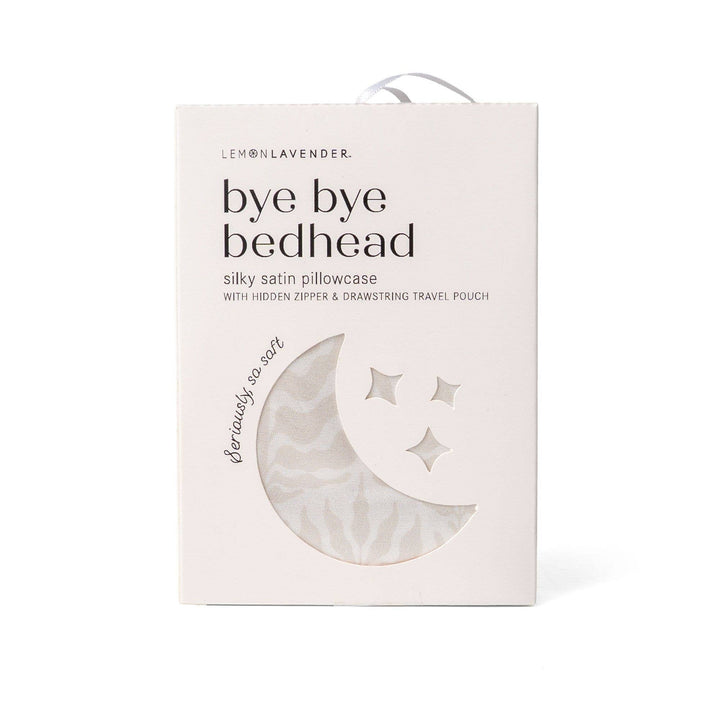 White box with cut-out reveals silky pillowcase; features frizz control, hidden zipper, travel pouch. Size options not shown.