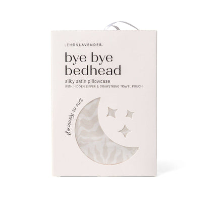 A white box labeled “Lemon Lavender Silky Pillowcase Pattern Assort” with a crescent moon and three stars cutout contains a silky satin pillowcase, hidden zipper, and drawstring travel pouch. Sizes available: standard, queen, king.