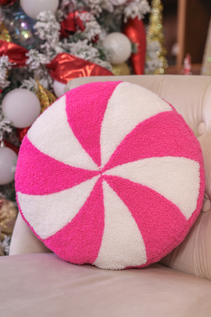 Pink Peppermint Pillow with a swirling pink and white candy pattern. Available in multiple sizes.