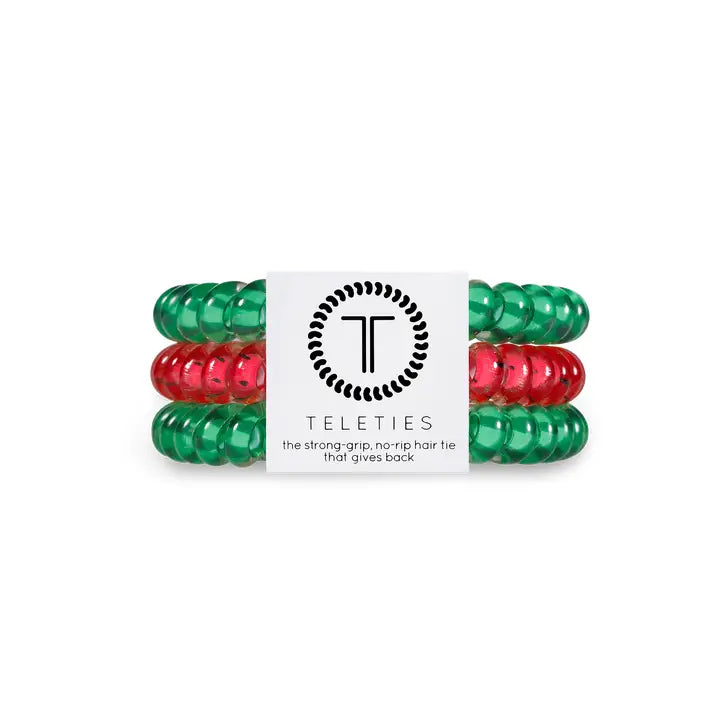 Three TELETIES Hair Ties—two green, one red—stacked with branded label. Available in small, large sizes.