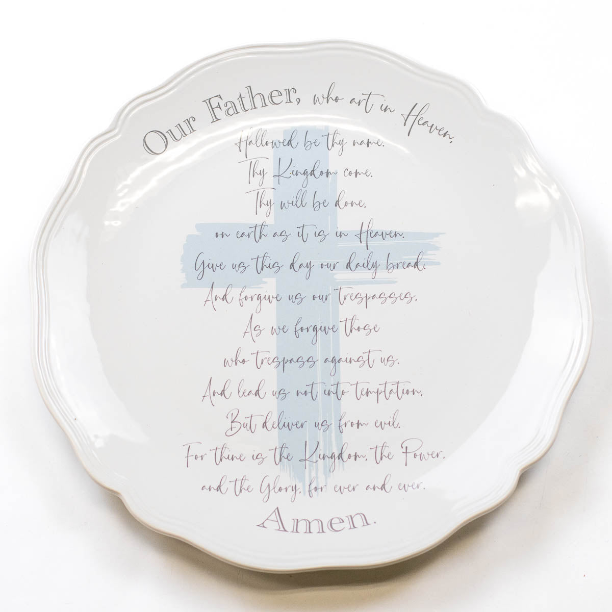 A Lord's Prayer Round Platter with a cursive handwritten script of the prayer, centered within the round, scalloped edges of the plate. The background is plain white.