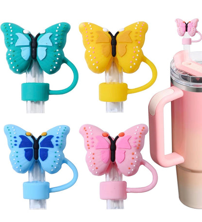 Four Butterfly Straw Covers in teal, yellow, blue, and pink. Available in small and large sizes.