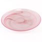 Round clear glass plate with swirling pink patterns. Available sizes: 8", 10", and 12".