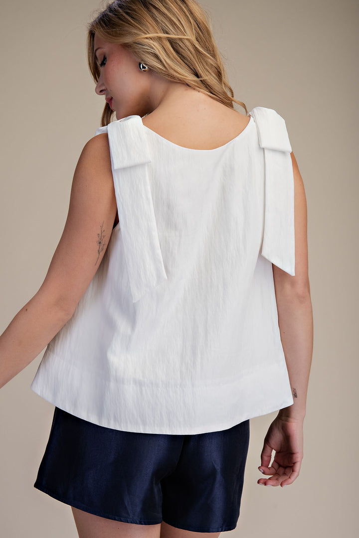 White Scoop Neck Bow Shoulder Top, features bow details on shoulders. Available in sizes XS-XL.