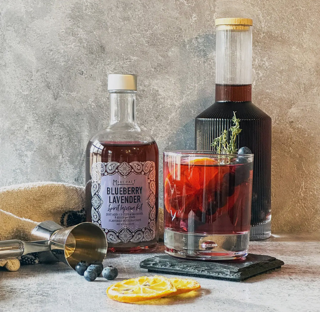 Blueberry lavender cocktail in glass, made with Spirit InFusion Kit. Kit available in 16oz and 32oz sizes.