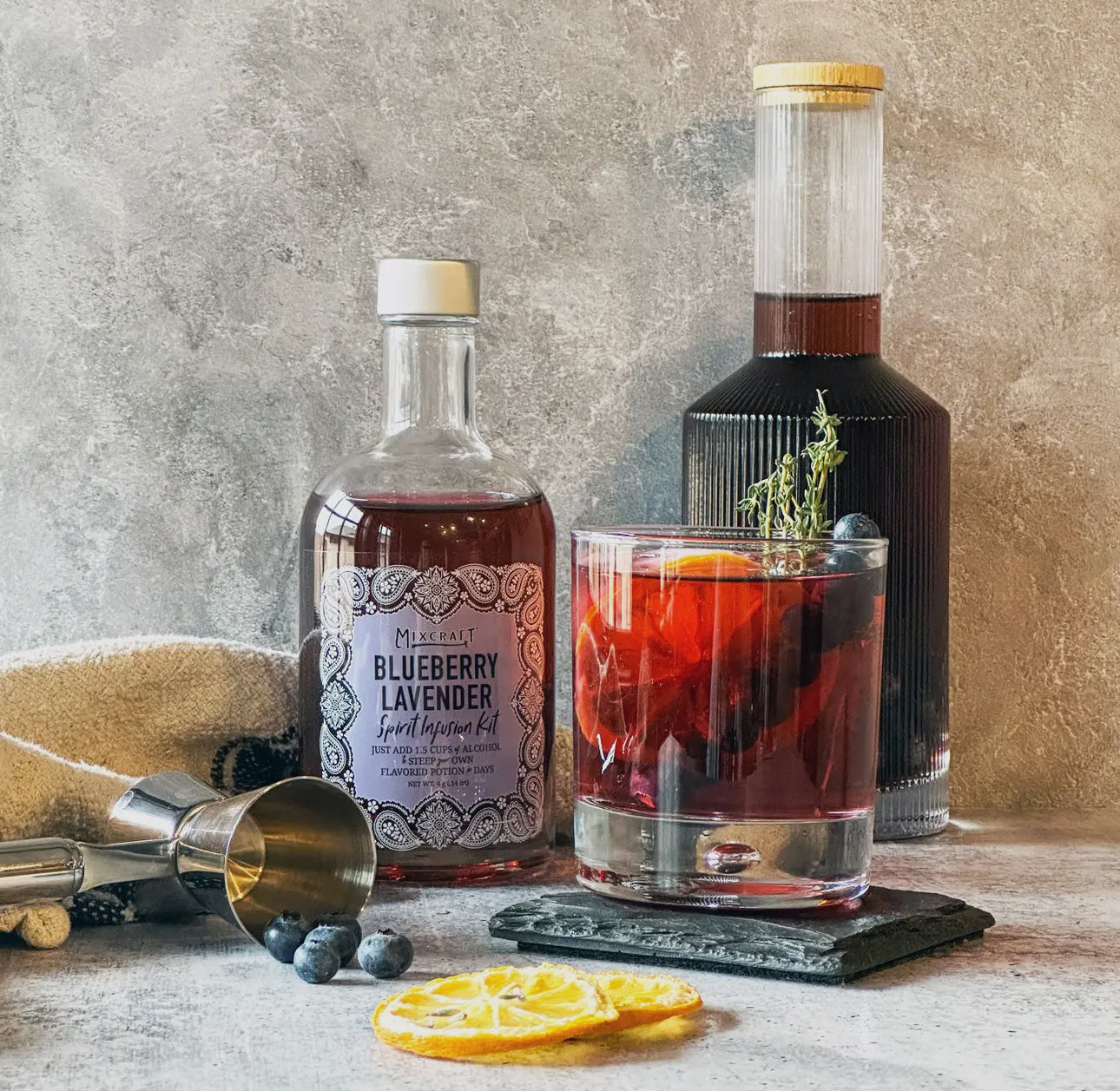 Blueberry lavender cocktail in glass, made with Spirit InFusion Kit. Kit available in 16oz and 32oz sizes.