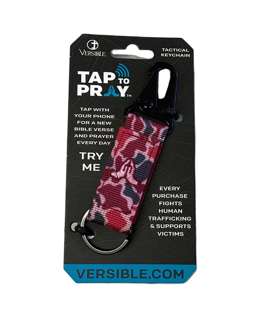 Red and blue camouflage-patterned fabric Tap To Pray keychain with a black clip and metal ring.
