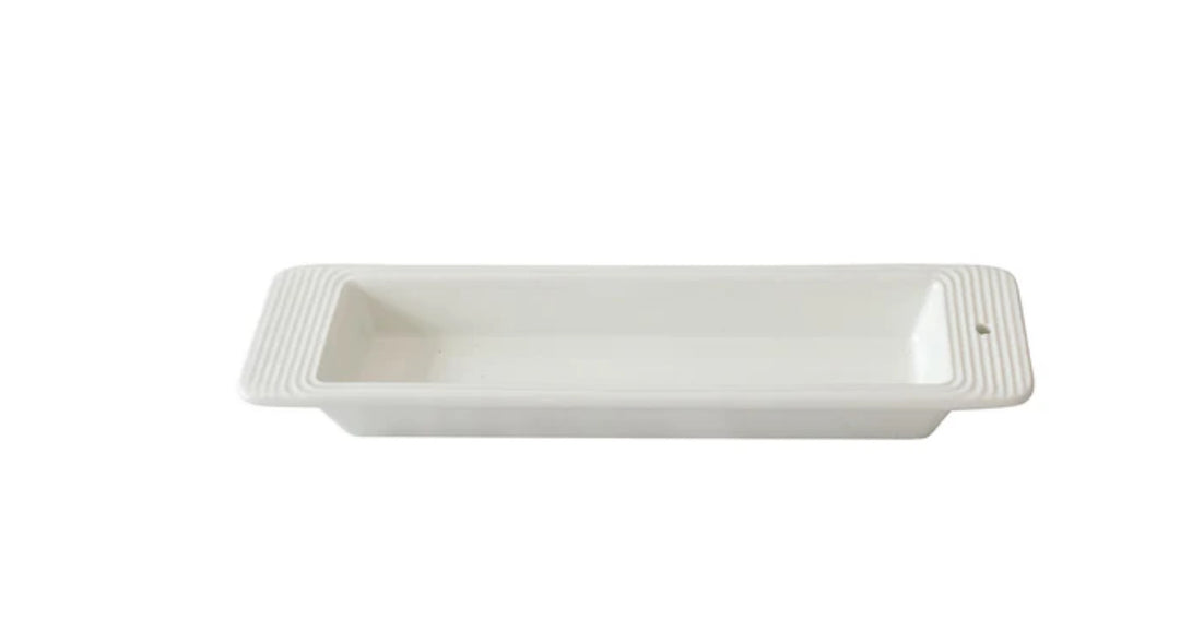 Rectangular white ceramic tray with ribbed side handles. Available in small and large sizes. Ideal for serving crackers.