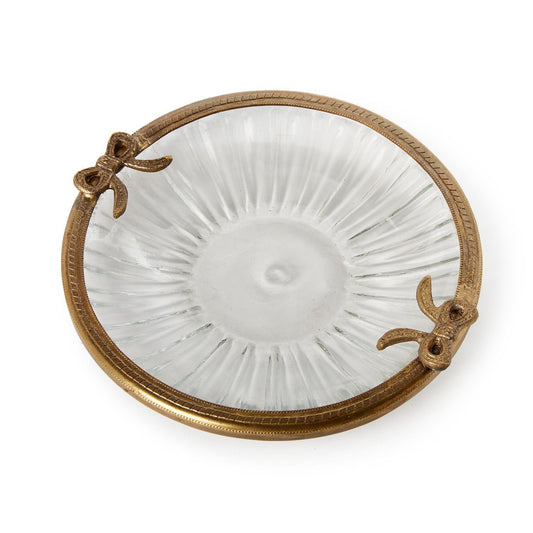 Round glass trinket tray with textured lines, antique gold rim, bow accents; available in 8" and 12" sizes.