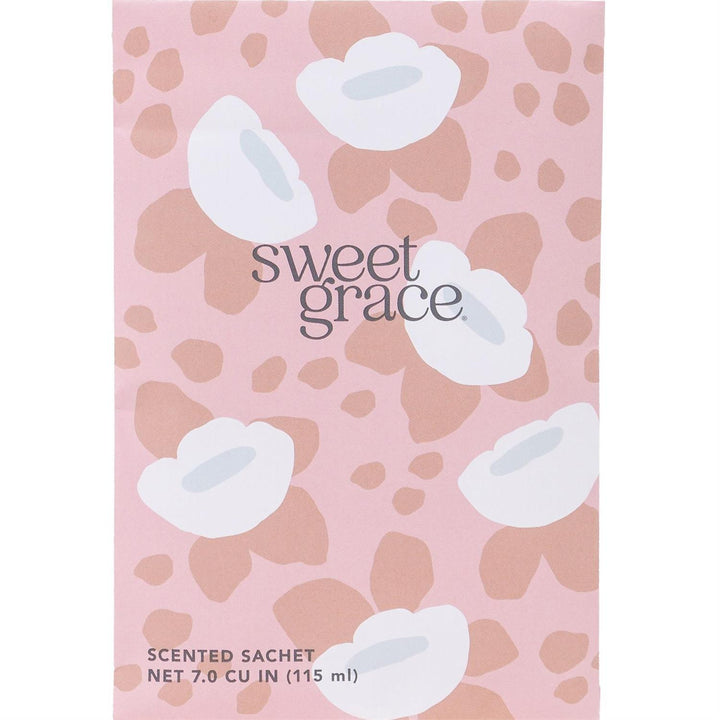 Pink Sweet Grace Sachet, white and beige floral design, 7.0 CU IN (115 ml) size. "sweet grace" in gray letters on front.