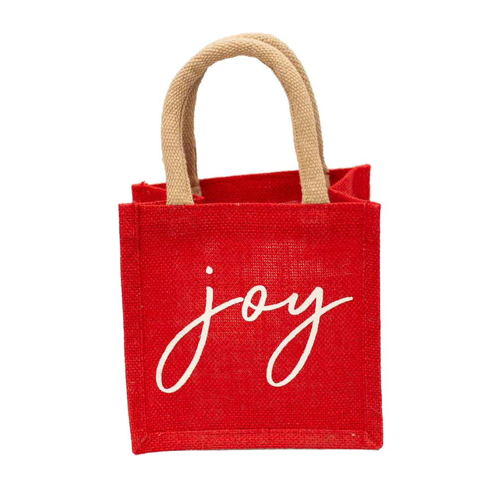 Holiday Petite Gift Tote: a small red reusable mini gift bag with woven handles and “joy” in white script.