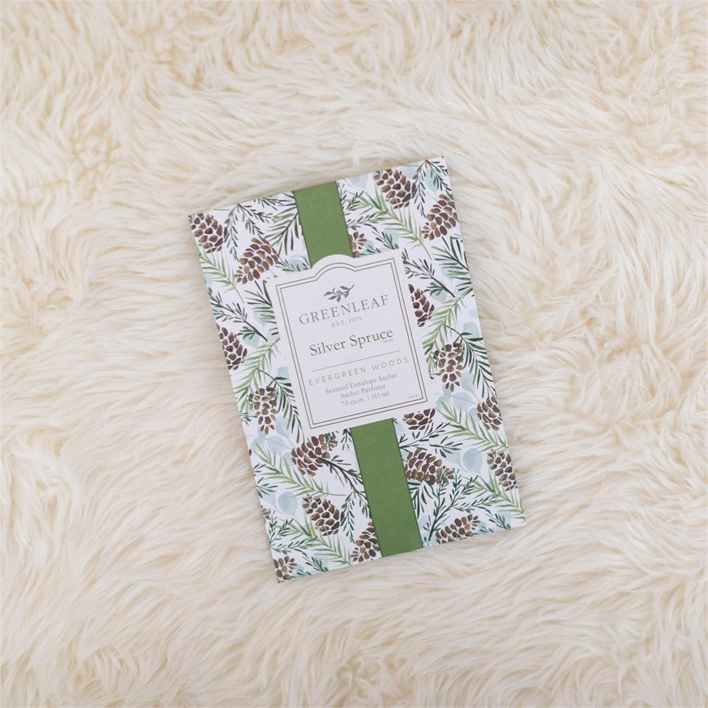 Silver Spruce Large Sachet, 115 ml, featuring a pinecone and evergreen needle pattern and green center ribbon.