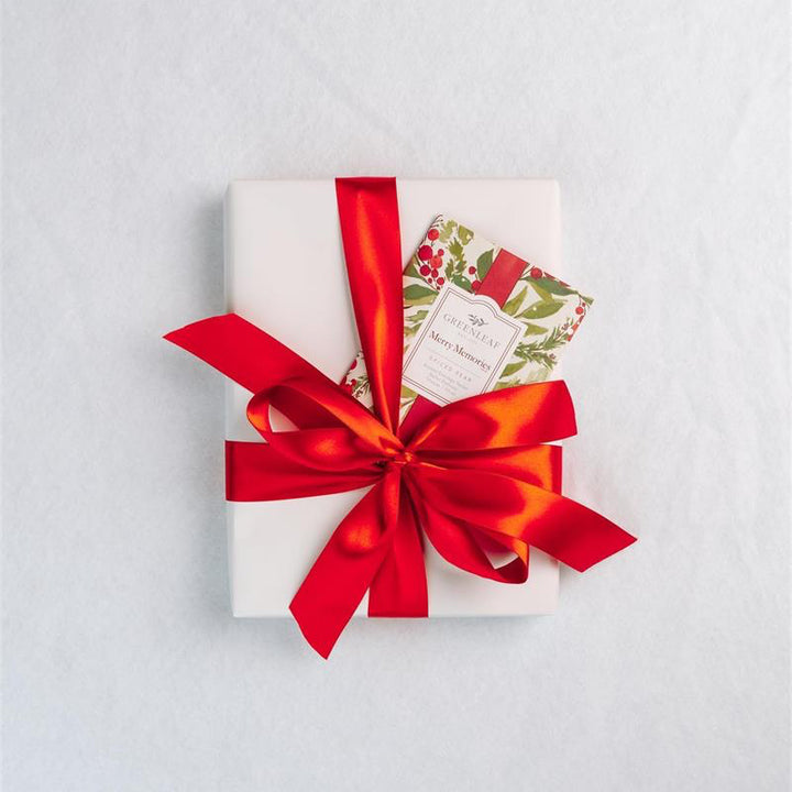 Merry Memories Large Sachet with a botanical print and red ribbon.