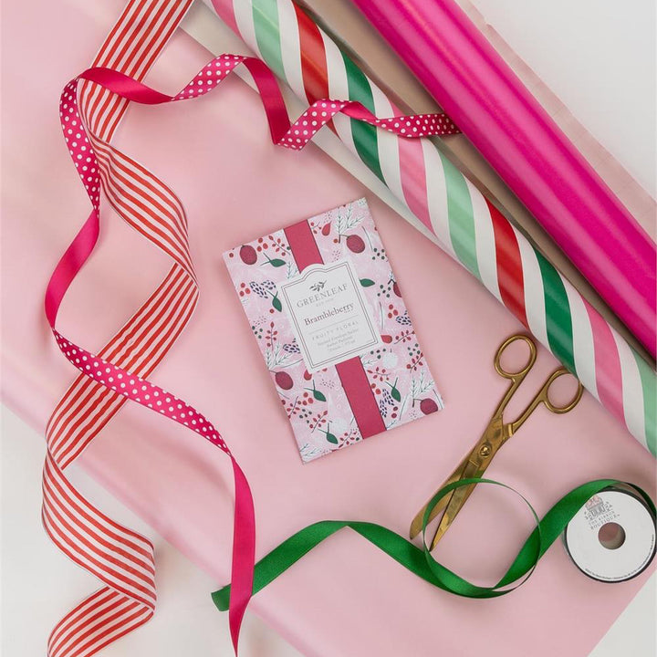 Large Brambleberry sachet with rectangular floral print and central vertical ribbon.