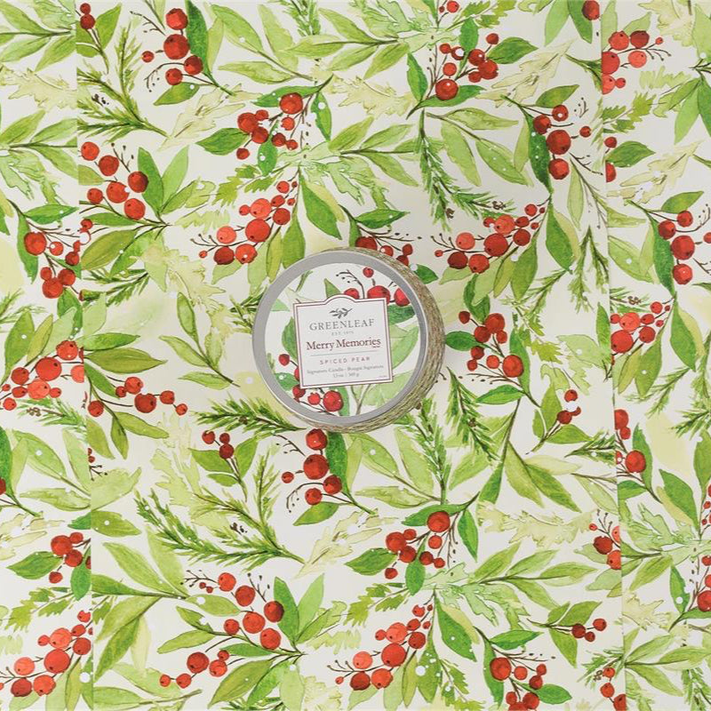 Merry Memories Signature Candle tin with holly and berry pattern.