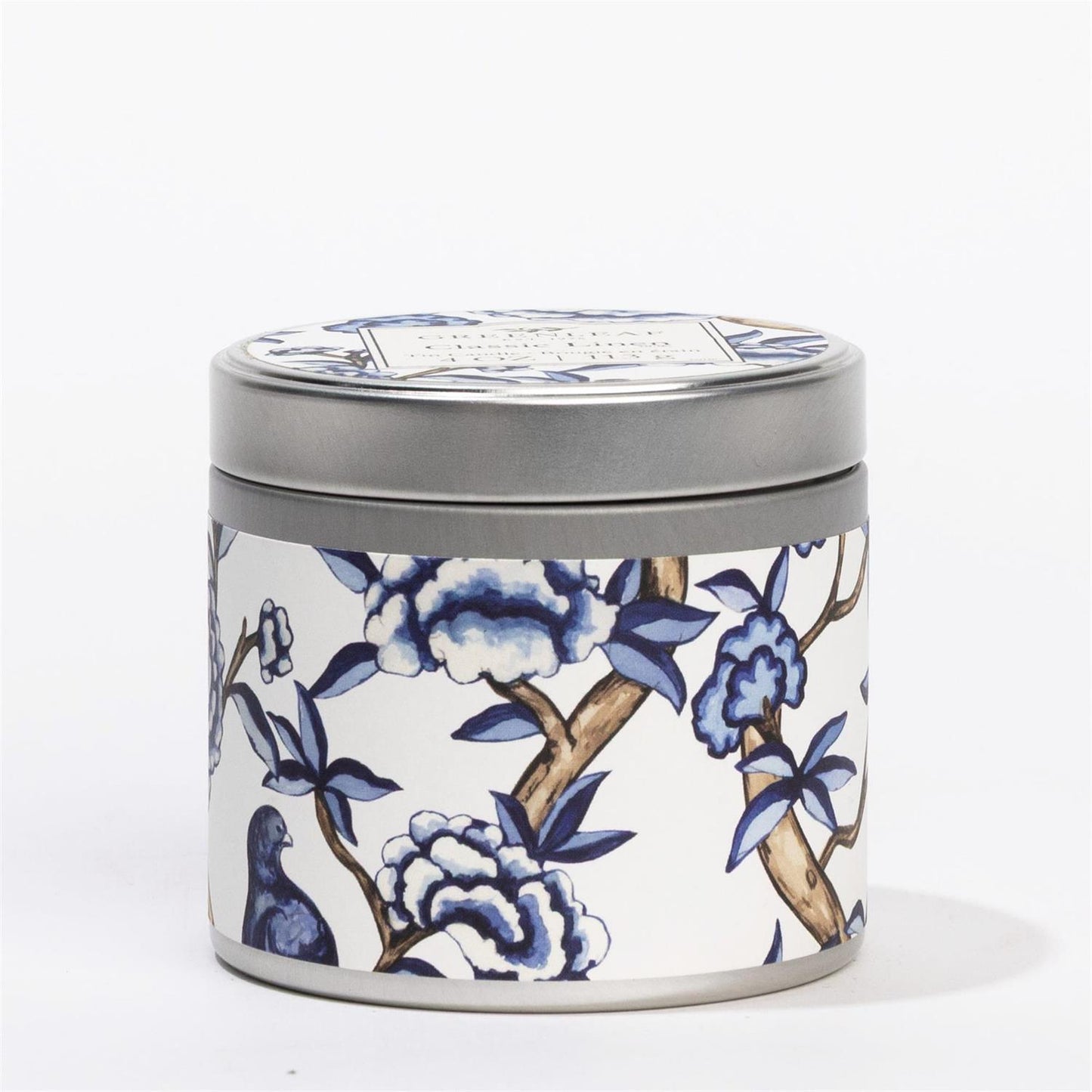 Round Classic Linen Tin Candle with silver lid, blue and white floral-bird design. Available in 4oz and 8oz sizes.