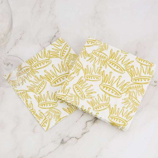 La Couronne Cocktail Napkins, 5" square, white with gold crown pattern. Sold in packs of 20.