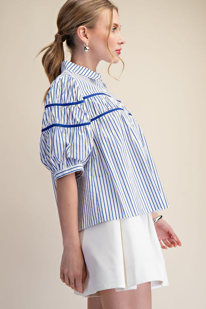 Blue and white Gathered Piping Striped Blouse with puff sleeves. Available in sizes XS–L.