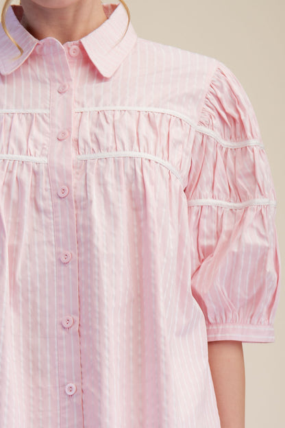 Light pink Gathered Piping Striped Blouse with white stripes, gathered piping, puff sleeves. Available in 2 colors, sizes XS-XL.