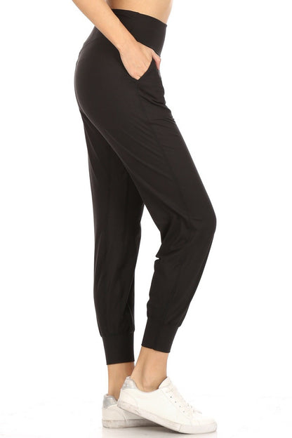 Plus Size Active Joggers in black, butter-soft texture, with pockets. Sizes: 1X-4X.