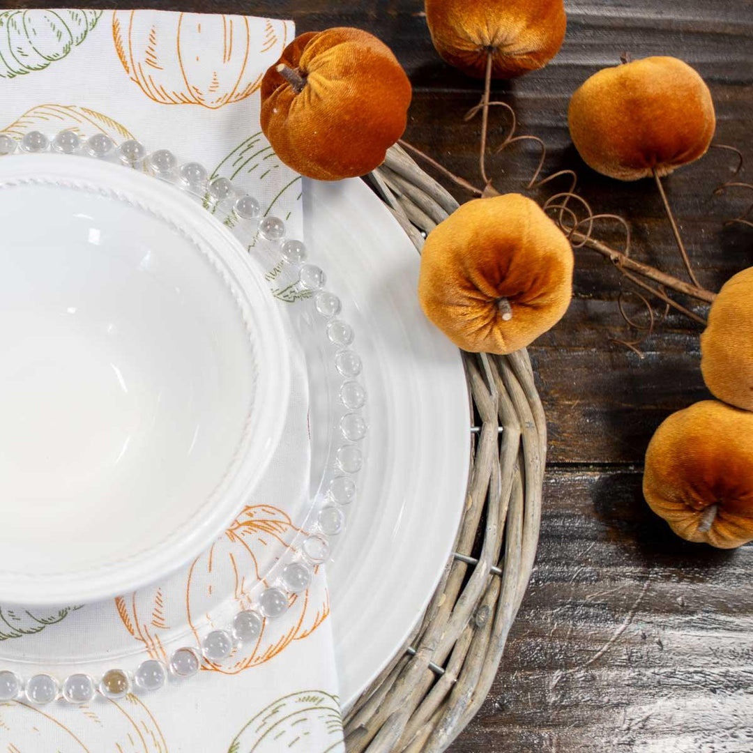 Decorative orange velvet pumpkins with Pumpkin Stem available in two colors and multiple sizes.