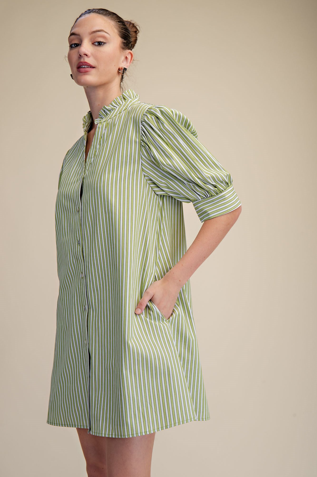 Striped Sage Ruffle Dress: loose cotton, puffed sleeves, ruffle neckline. Available in sizes XS–XL.