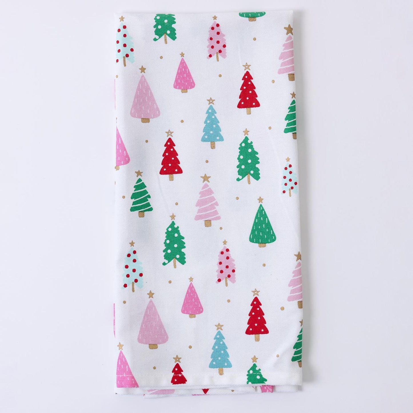 Festive Christmas Tea Towels feature white fabric with colorful Christmas trees in pink, green, and red, adorned with gold, red, or green decorations and topped with a small star. Sizes available: 18" x 28".