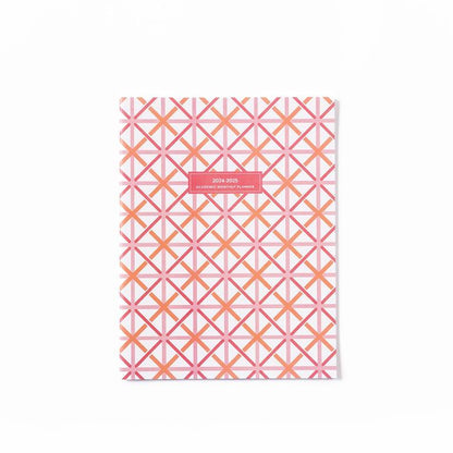 Large Academic Monthly Planner '24-'25 with pink-orange geometric star cover, white-on-red label. Available in large size.