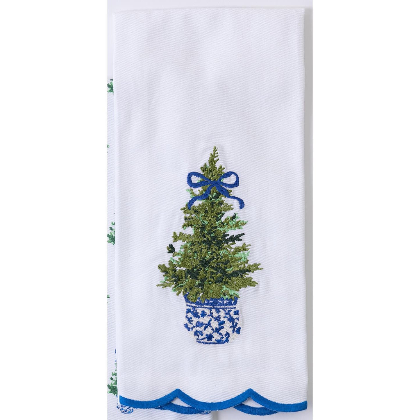 Festive Christmas Tea Towels: White with embroidered potted evergreen tree design, blue patterned pot, festive blue ribbon, and scalloped blue edge. Sizes available: 18" x 28".