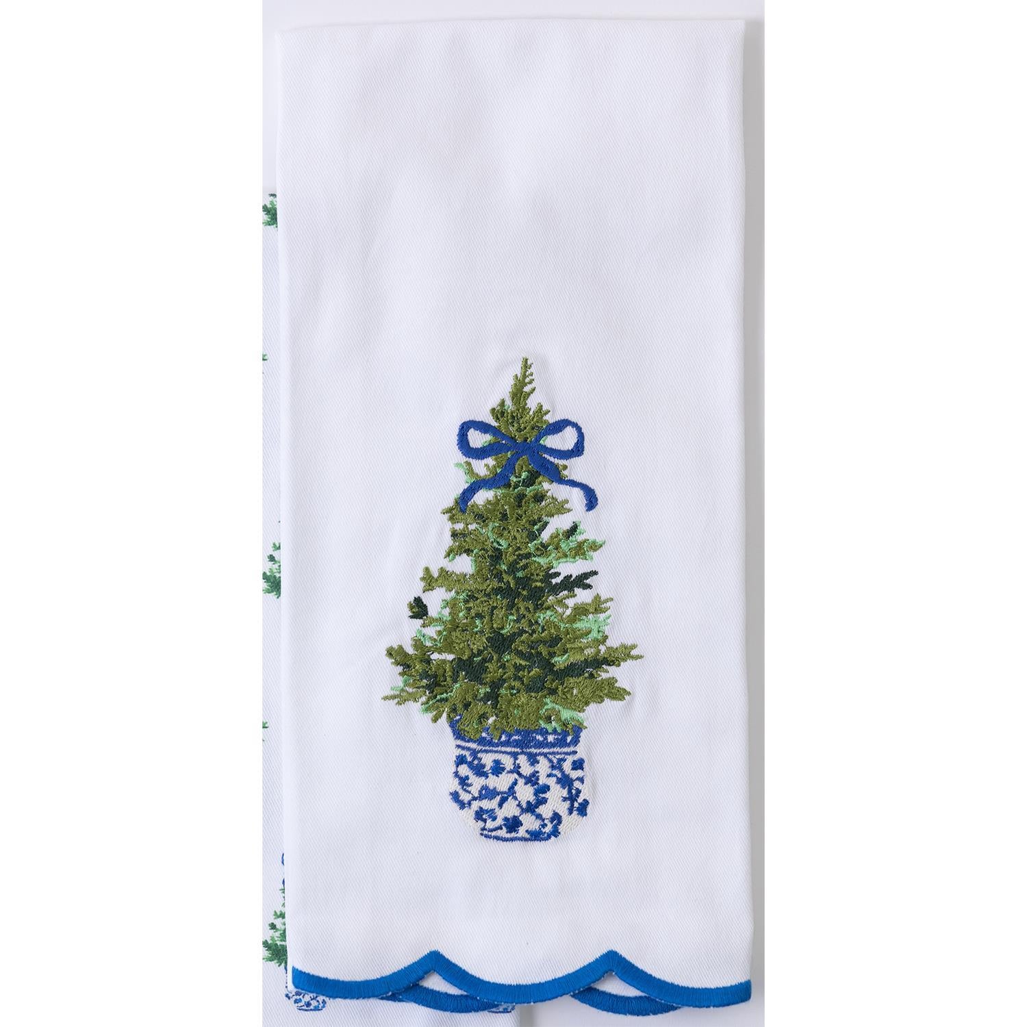 Festive Christmas Tea Towels: White with embroidered potted evergreen tree design, blue patterned pot, festive blue ribbon, and scalloped blue edge. Sizes available: 18" x 28".