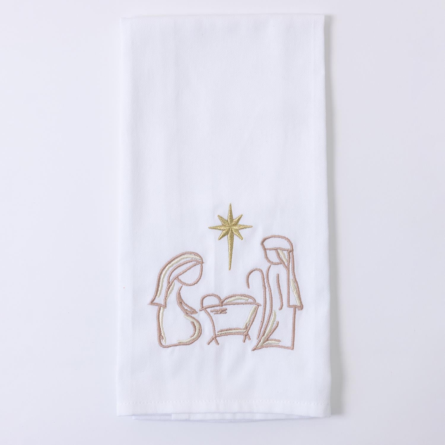 White Christmas Embroidered Tea Towels featuring a nativity scene with Mary, Joseph, and baby Jesus under a golden star. Sizes available: 16" x 28".