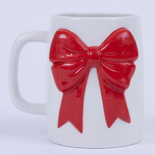 **Product:** The Organic Bow Mug

**Description:** White ceramic mug with a large, raised red bow decoration. Microwave safe.

**Sizes Available:** Standard 12 oz.
