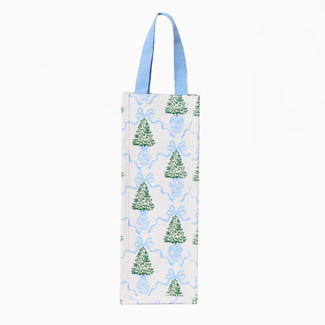 Winter Pines Vineyard wine bag, tall narrow shape with light blue handle and green pine tree in blue vase pattern connected by blue bows.