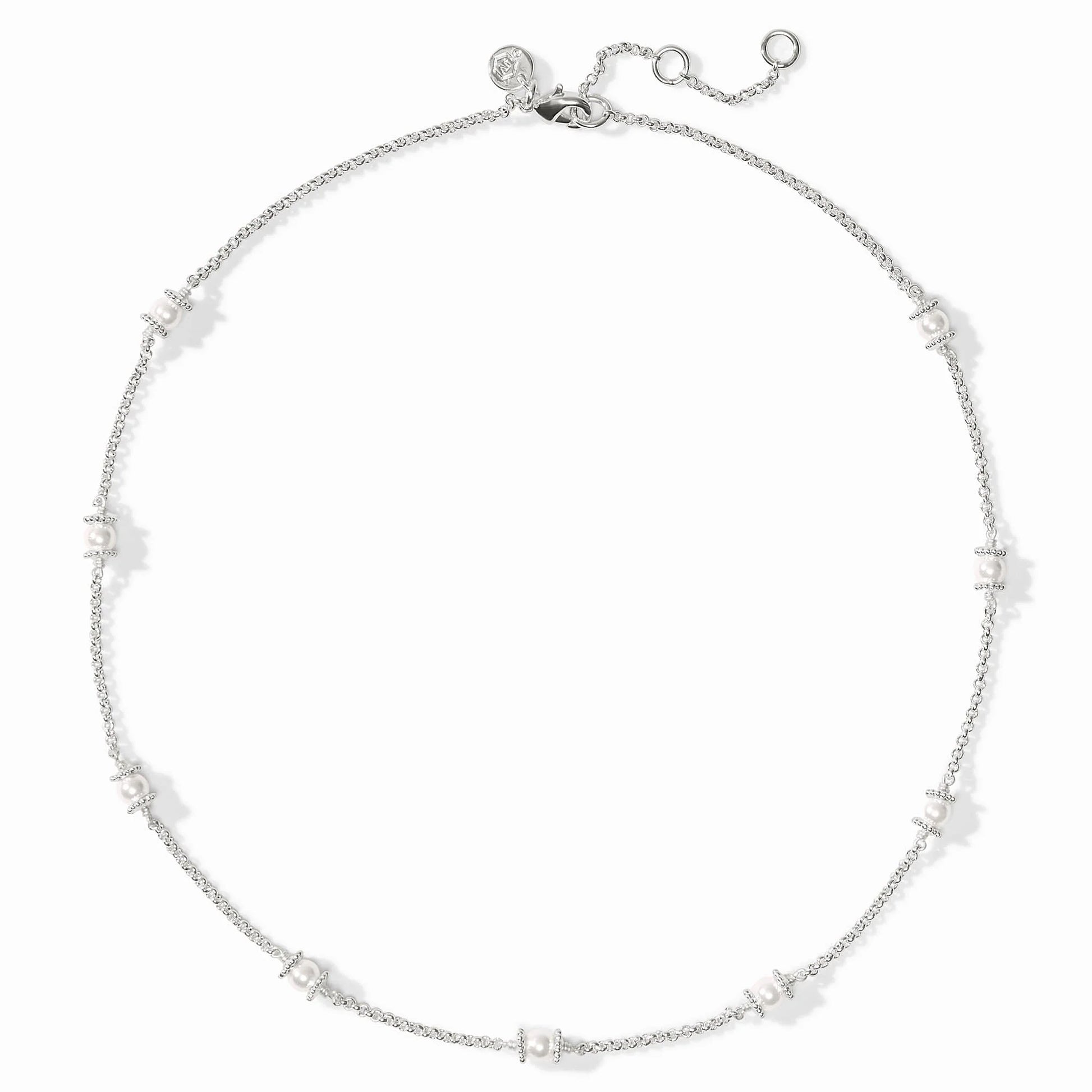 Small white shell pearl clusters on silver-plated adjustable chain; round charm at clasp. Available in multiple sizes.