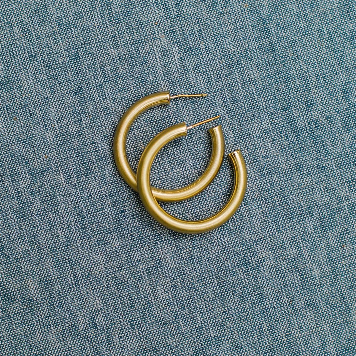 Cameron Earrings: gold hoops with hypoallergenic posts. Available in small, medium, and large sizes.