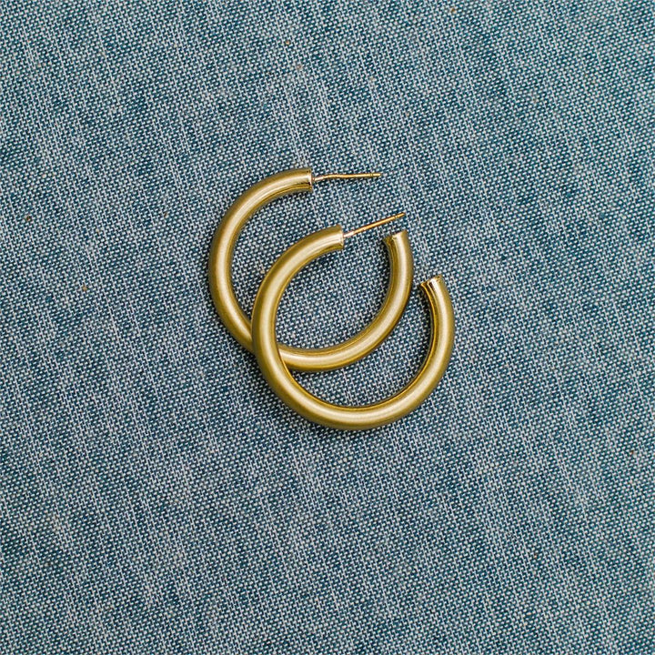 Cameron Earrings: gold hoops with hypoallergenic posts. Available in small, medium, and large sizes.