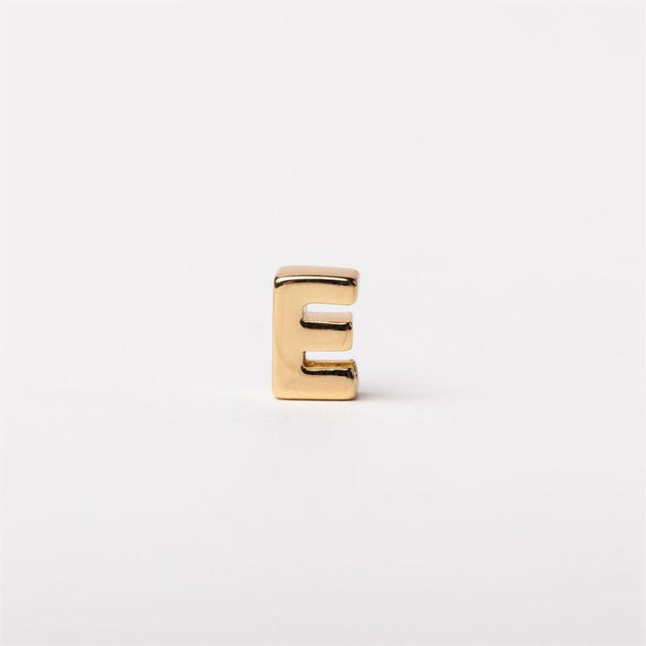Small gold metallic letter "E" charm. Available sizes: 6mm, 8mm, and 10mm.