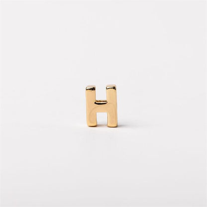 Small shiny gold letter "H" charm, available in multiple sizes, for Luxe Charm Necklace Bar.