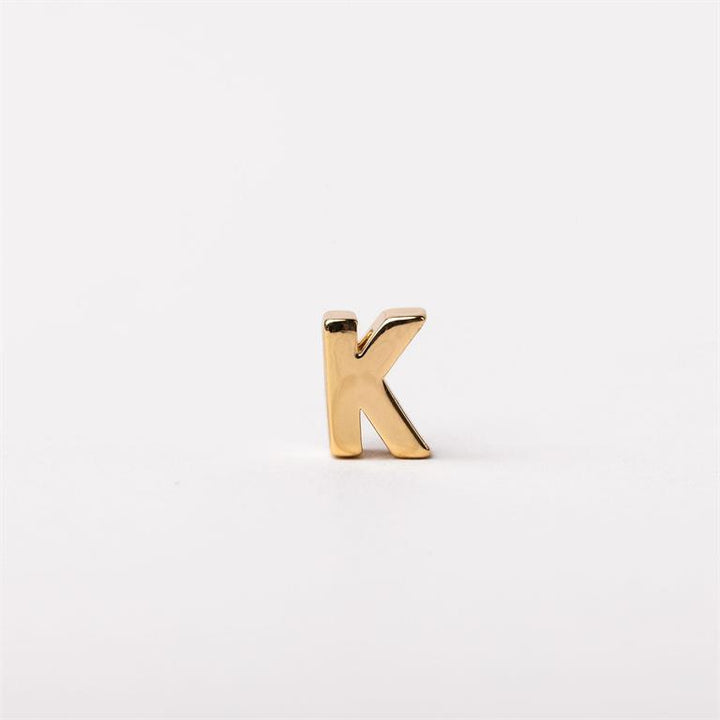 Shiny gold letter "K" charm for Luxe Charm Necklace Bar, available in 16", 18", and 20" sizes.