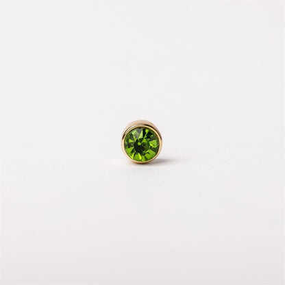 Small round green gemstone in a simple gold bezel, available in 6mm and 8mm sizes.