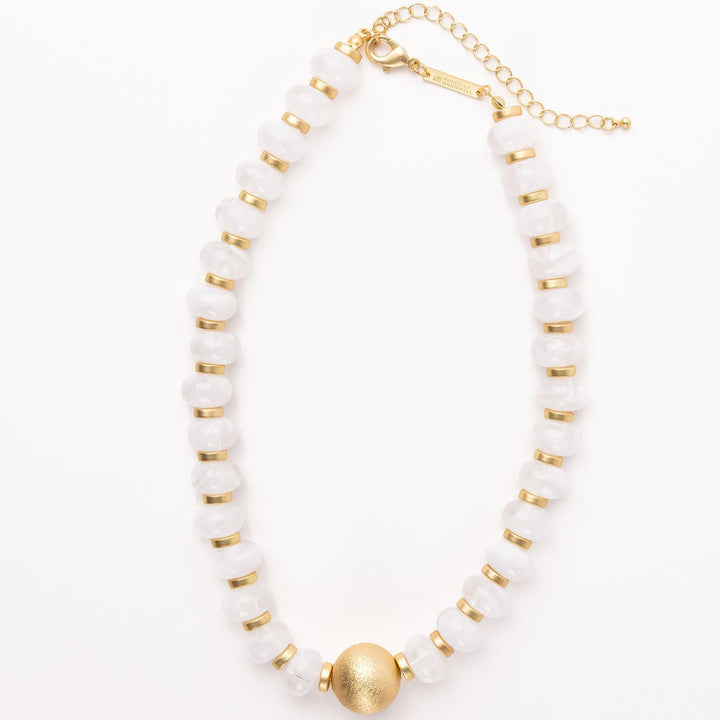 Kylie Necklace: white round beads, gold accents, textured gold center bead, gold chain clasp. Available in 16" and 18".