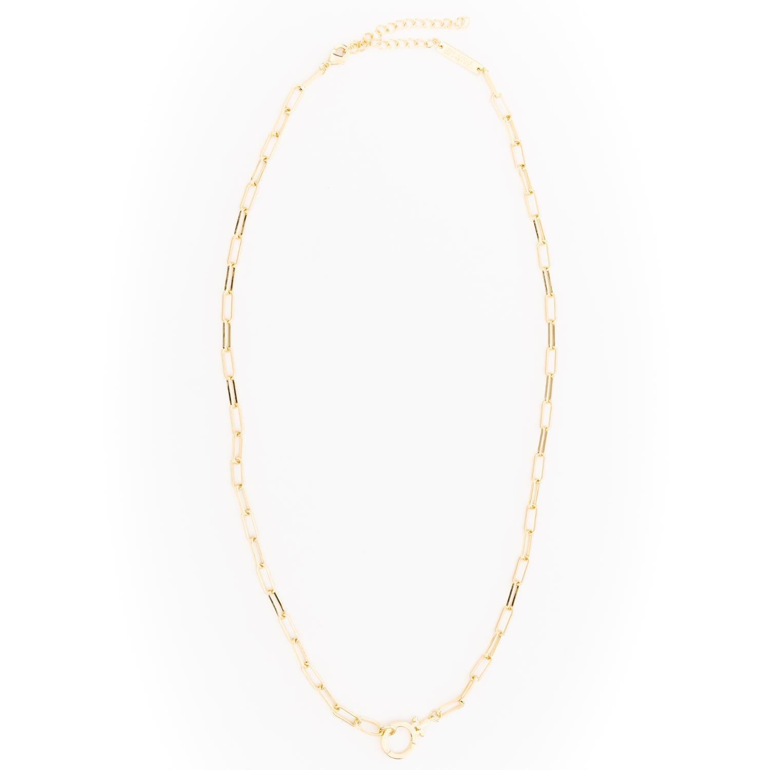 Thea Charm Bar is an 18k gold-plated, hypoallergenic necklace with elongated rectangular links and an adjustable clasp, designed for customizable charms. Available in multiple lengths.