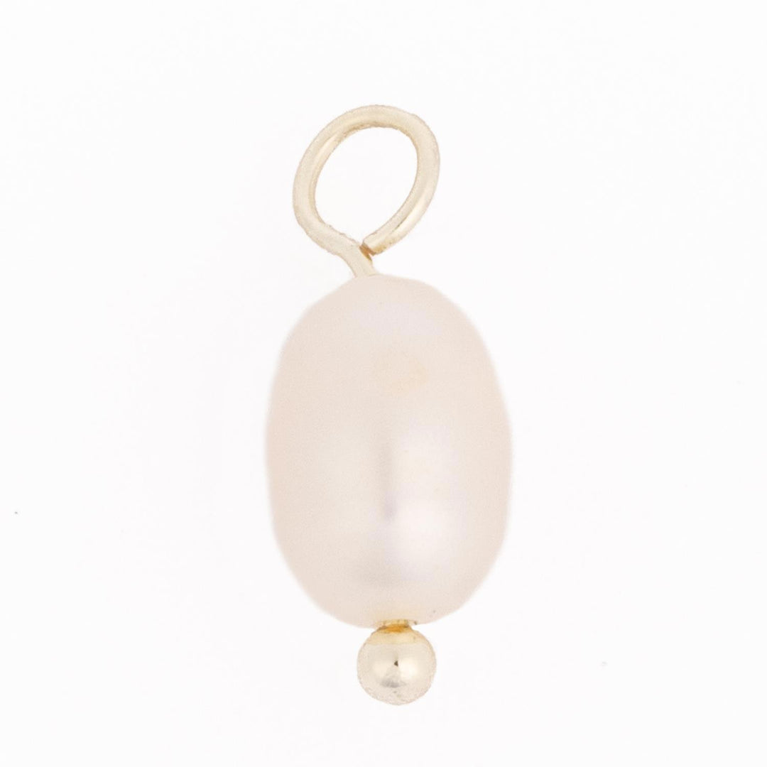 Thea Charm Bar: single white oval pearl pendant with a small gold bead at the bottom and gold loop at the top, on an 18k gold-plated chain. Hypoallergenic. Available in multiple sizes.