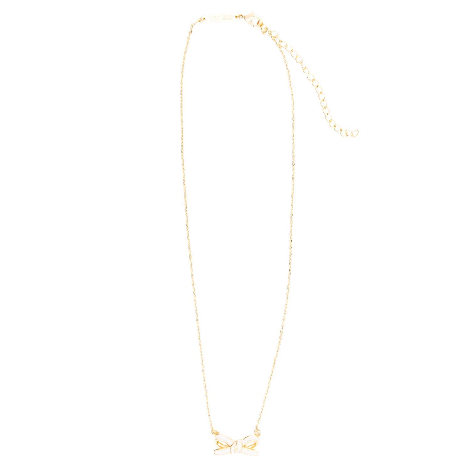 The Luxe White Bow Necklace features an 18k gold-plated bow with a delicate pendant charm, a thin chain, and an adjustable clasp with extender links. Available in adjustable sizes for the perfect fit.