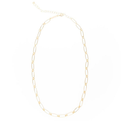 The Luxe Clip-On Charm Necklace Bar is an 18K gold plated necklace with elongated oval links and an adjustable clasp. Available in various lengths for customization with clip-on charms.